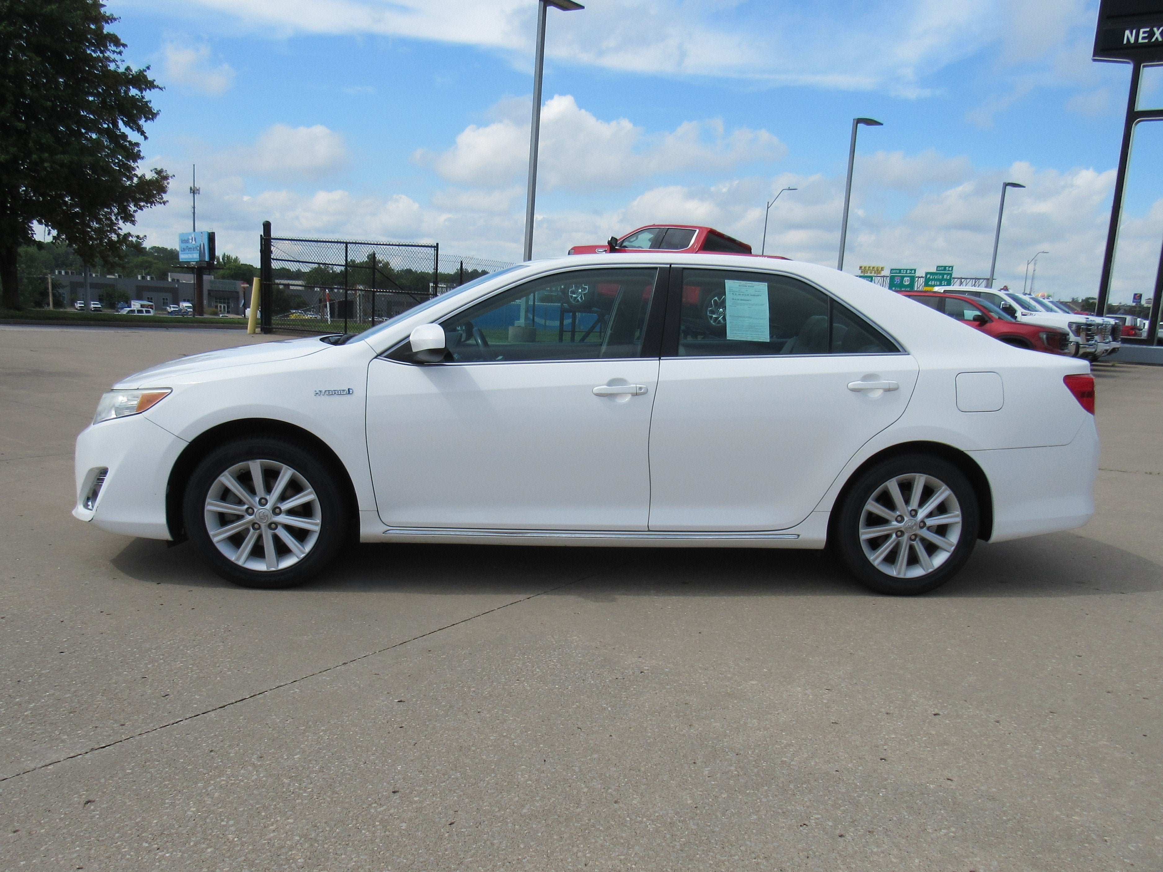 Used 2013 Toyota Camry XLE Hybrid with VIN 4T1BD1FK0DU065887 for sale in Kansas City